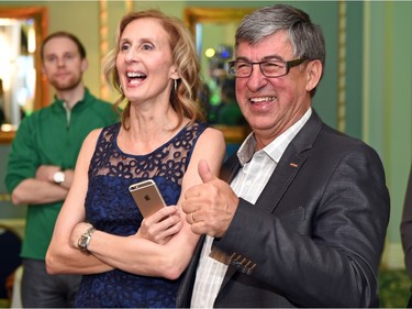 Saskatchewan Party supporters including former Sask Party finance minister Ken Krawetz (R) excited about the election results at the Hotel Saskatchewan in Regina on April 4, 2016.