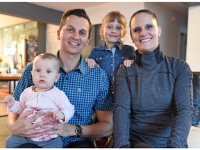 Former University of Regina Cougars women's basketball player Bree Burgess (right) with her partner Jared Woloshyn (left) and their two daughters, Sloan Woloshyn and Kierden Woloshyn. Burgess is being inducted into the U of R's Sports Hall of Fame on Thursday.
