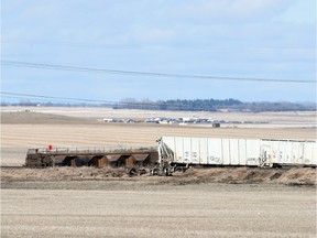 Damaged rail cars lay on their sides near a rail llne west of the Evraz steel works on Regina's northern edge.