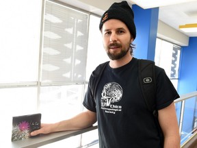 Erik Mehlsen (stage name Del Suelo) shown at the Regina Public Library in downtown Regina, where he spent a lot of time writing his novel.