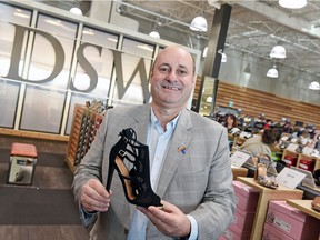 Bruce Dinan, president and CEO of Town Shoes Ltd., at the opening of Regina's first Designer Shoe Warehouse at 4882 Gordon Road in Grasslands Commercial Park. The Regina location is one four locations DSW is opening this spring.