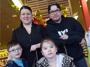 From left, Kash Bird, Ashley Bird, Katana Bird and Richard Bird at Crawford's No Frills on Thursday. 
The family received $18,450 from the President's Choice Children's Charity towards purchasing a wheelchair accessible vehicle for the family.