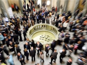 Politicians, officials and guests in the Legislative Building rotunda after the March 2015 provincial budget was delivered.