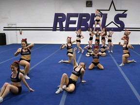Rebels Cheerleading Athletics' Smoke team, shown at practice this week, is ready for a trip to Florida.