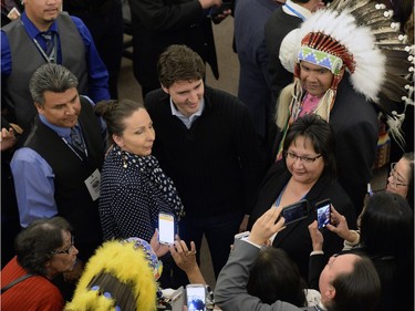 Prime Minister Justin Trudeau stops for photos after meeting with the leaders of the File Hills Tribal Council at the Treaty Four Governance Centre in Fort Qu'Appelle Saskatchewan Tuesday April 26, 2016.