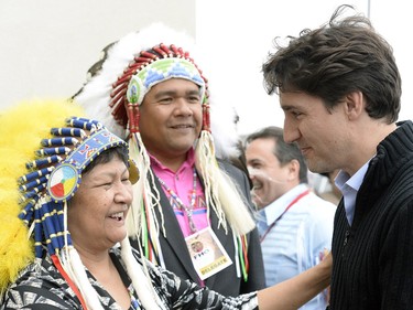 Prime Minister Justin Trudeau  arrives at the Treaty Four Governance Centre in Fort Qu'Appelle Saskatchewan Tuesday April 26, 2016 and meets Elaine Chicoose vice chair and Edmond Bellegarde chair of the File Hills Qu'Appelle Tribal Council before meeting with the leaders of the File Hills Tribal Council.