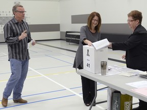 Saskatchewan Party Leader Brad Wall and his wife Tami cast their ballots in their riding in Swift Current, Sask.