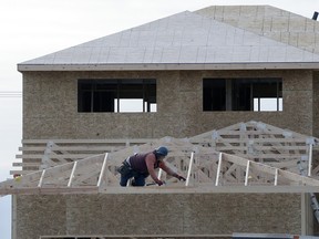 Home under construction in Harbour Landing in February. Despite a 28 per cent reduction in housing starts in 2015, CMHC says there is "strong evidence of overbuilding'' in Regina.