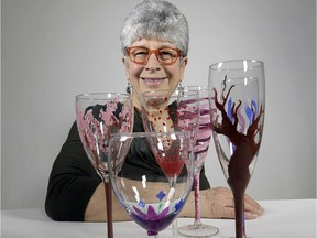 Brenda Cornwell with an array of hand-painted souvenir wine glasses that will be part of the Cystic Fibrosis Gala Art Show, which will be held May 29. The fundraiser will include work by 20 artists, ranging from emerging professional artists to internationally known artists, including Wilf Perreault and Vic Cicansky.