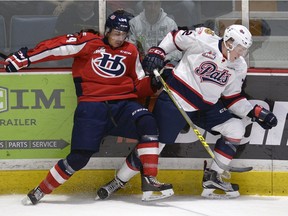 The Regina Pats' Robbie Holmes, shown on the right during a WHL playoff game against the Lethbridge Hurricanes, has quickly made a positive impression in the major-junior ranks.
