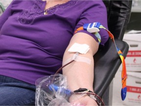 a blood donor giving a blood donation.