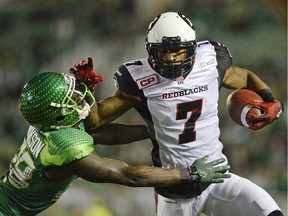 Receiver Maurice Price, shown straight-arming Saskatchewan Roughriders defensive back Tristan Jackson last season while playing for the Ottawa Redblacks in 2015, surprised the Green and White by filing his retirement papers this week.