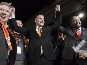 Federal NDP leader Tom Mulcair (right) was on hand to congratulate Cam Broten, centre when he won the Saskatchewan NDP leadership three years ago. Both leaders now face uncertain futures.