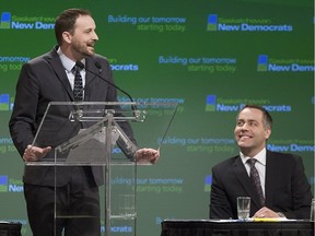 Cam Broten, right, listens as leadership competitor Ryan Meili speaks to NDP supporters in 2012.