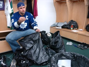 Saskatchewan Roughriders offensive lineman Mike Abou-Mechrek cleans out his locker after the 2008 season. Little did the 10-year CFL veteran suspect that he had played his last game.