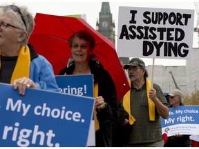 Supporters rally outside the Supreme Court of Canada on the first day of hearings in 2014 into whether Canadians have the right to seek help to end their own lives.