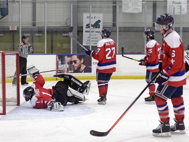 The game tied 4-4 in triple overtime, Regina Capitals goalie Thomas Spence spins as the North Peace Navigators put the puck in his net during the bronze medal match of Keystone Cup held at Co-operators Centre in Regina, Sask. on Sunday April. 17, 2016