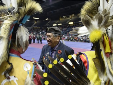 Veteran Roy Alexson greets other participants at the FNUC Pow-wow held at the Brandt Centre in Regina on Saturday April 2, 2016.