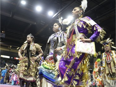 Women jingle dance at the FNUC Pow-wow held at the Brandt Centre in Regina on Saturday April 2, 2016.