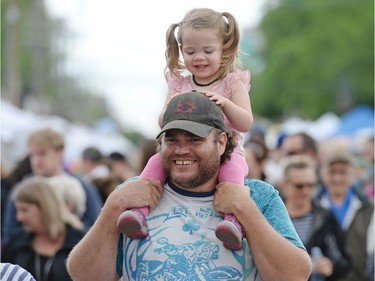 Brooklyn and Curtis Benz at the Cathedral Village Arts Festival on 13th Ave. in Regina, Sask. on Saturday May. 28, 2016.