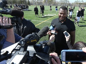 University of Manitoba Bisons defensive lineman David Onyemata speaks to the media after being selected in the NFL draft. Onyemata is widely regarded as the best player available in the 2016 draft, but he is unlikely to be selected early due to the likelihood of him playing in the NFL.