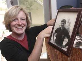 Rachel Notley, when a newly elected MLA for the NDP in 2008, with photos of her dad Grant Notley the former leader of the NDP in Alberta .