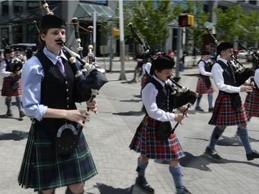 Eilidh MacDonald and the rest of the Conservatory of Performing Arts Pipe Band sport fake moustaches at the Saskatchewan Highland Gathering and Celtic Festival in Regina, Sask. on Sunday May. 22, 2016.