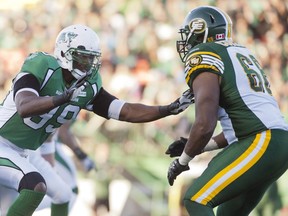 The Riders acquired offensive tackle Thaddeus Coleman (right), shown in a 2013 file photo, from the Edmonton Eskimos on Monday.