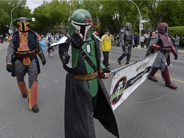 Mandalorian Mercs Costume Club members march in the kick-off parade of the Cathedral Village Arts Festival in Regina, Sask. on Monday May. 23, 2016.
