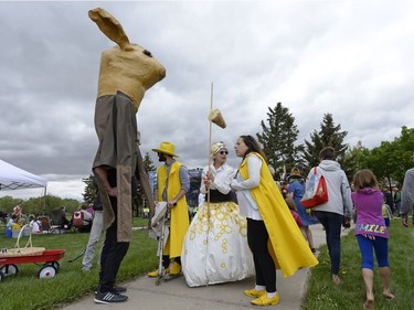 New Dance Horizons members, including a giant rabbit, stand near the Neil Balkwill Centre at the kick-off parade of the Cathedral Village Arts Festival in Regina, Sask. on Monday May. 23, 2016.
