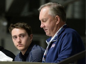 Nick Henry, left, sits beside Regina Pats head coach and general manager John Paddock during the WHL team's spring camp at the Co-operators Centre on Sunday.