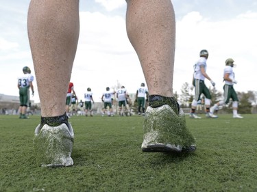 Rams head coach Steve Bryce's shoes are covered in astroturf during the Rams' Spring Camp at the University of Regina.