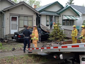 The Regina Police Service and the Regina Fire & Protective Services were on the scene of a car colliding with a house on the 2100 block of Winnipeg Street in Regina on Tuesday.