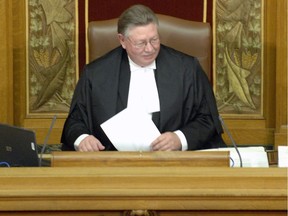 Speaker of the House Dan D'Autremont recites a prayer to begin each sitting day of the Saskatchewan legislature.