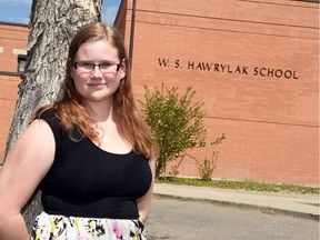 Thirteen-year-old Grade 8 student Hannah Gray Brogden in front of W.S. Hawrylak School in Regina. Hanna is upset because her school held a Grade 8 girls school meeting to talk about the dress code.