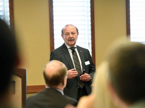 Workers' Compensation Board CEO Peter Federko addressing the WCB annual general meeting at the Travelodge in South Regina. Federko was answering questions about the WCB's $281 million surplus, which employers are demanding to be paid back to them ASAP.