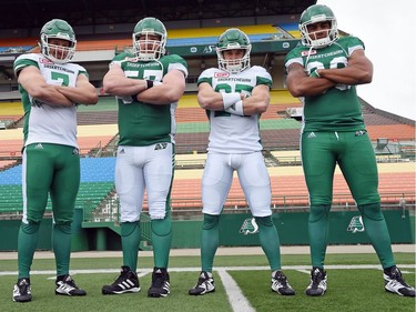 (L-R) Justin Capicciotti, Brendon Labatte, Matt Webster and Spencer Moore at the launch of the new Saskatchewan Roughriders adidas uniforms for the 2016 season. The black trim was removed from the jersey and the numbers and the pants feature four stripes on the left side – each one representing a Grey Cup victory over the years.