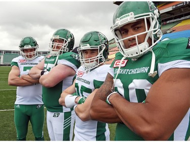 (L-R) Justin Capicciotti, Brendon Labatte, Matt Webster and Spencer Moore at the launch of the new Saskatchewan Roughriders adidas uniforms for the 2016 season. The black trim was removed from the jersey and the numbers and the pants feature four stripes on the left side – each one representing a Grey Cup victory over the years.