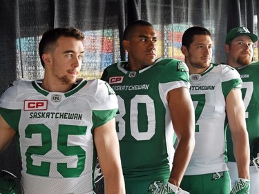 (L-R) Matt Webster, Spencer Moore, Justin Capicciotti and Brendon Labatt at the launch of the new Saskatchewan Roughriders adidas uniforms for the 2016 season. The black trim was removed from the jersey and the numbers and the pants feature four stripes on the left side – each one representing a Grey Cup victory over the years.