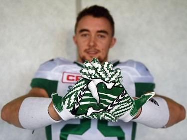 Matt Webster at the launch of the new Saskatchewan Roughriders adidas uniforms for the 2016 season. The black trim was removed from the jersey and the numbers and the pants feature four stripes on the left side – each one representing a Grey Cup victory over the years.