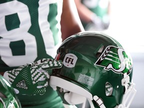 Spencer Moore at the launch of the new Saskatchewan Roughriders adidas uniforms for the 2016 season. The black trim was removed from the jersey and the numbers and the pants feature four stripes on the left side – each one representing a Grey Cup victory over the years.