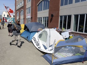 Protesters are still camped out and picketing in front of the INAC building 1827 Albert Street in Regina on Friday. BRYAN SCHLOSSER
