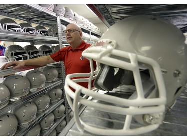 Len Antonini, executive director of RMF with football equipment at the facility for a story about how RMF continues to grow despite injury concerns.