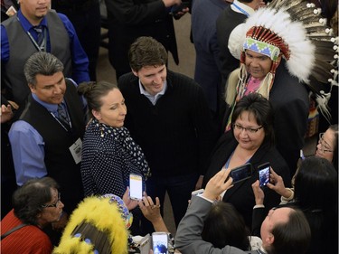 Prime Minister Justin Trudeau stops for photos after meeting with the leaders of the File Hills Tribal Council at the Treaty Four Governance Centre in Fort Qu'Appelle, Saskatchewan Tuesday April 26, 2016.