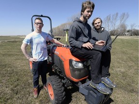 Sam Dietrich, Caleb Friedrick and Joshua Friedrick developed a robotic tractor, which won them a $50,000 prize at the 2016 agBOT Challenge in Indiana last week.  Dean Kertai (not pictured) was also a team member. BRYAN SCHLOSSER