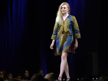 A model wears a design by FT Design Fashion by Fatouma Tshiswaka of Regina on the runway on the opening night of Saskatchewan Fashion Week at Canada Saskatchewan Production Studios in Regina.