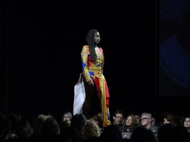 A model wears a design by FT Design Fashion by Fatouma Tshiswaka of Regina on the runway on the opening night of Saskatchewan Fashion Week at Canada Saskatchewan Production Studios in Regina.