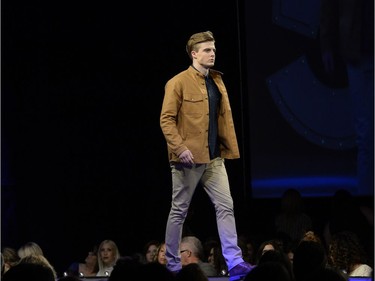 A model wears a design by NRTHRNTWNS Workshop by Hayley Clackson of Saskatoon on the runway on the opening night of Saskatchewan Fashion Week at Canada Saskatchewan Production Studios in Regina.