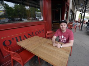 Kurtis Tokarchuk on the new now-smoke-free patio at O'Hanlon's. The pub is also banning the use of e-cigarettes inside and on the patio.