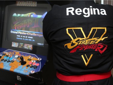 Norman Forrest wears his personalized gi that he will wear at the national Street Fighter V competition in Toronto on May 8, 2016.